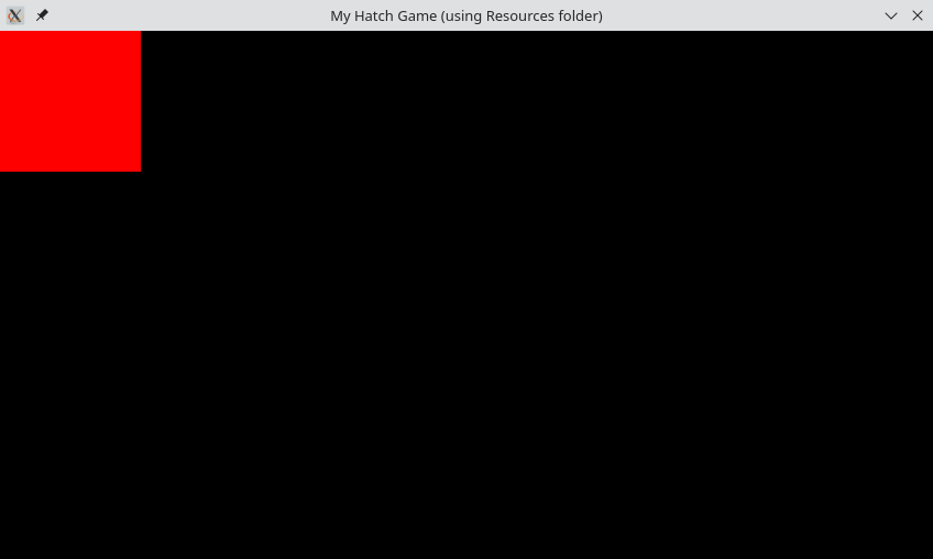 Black screen with a red square on the top left corner