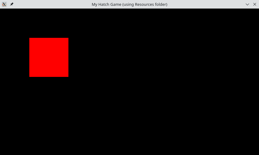 Black screen with a red square close to the top left corner